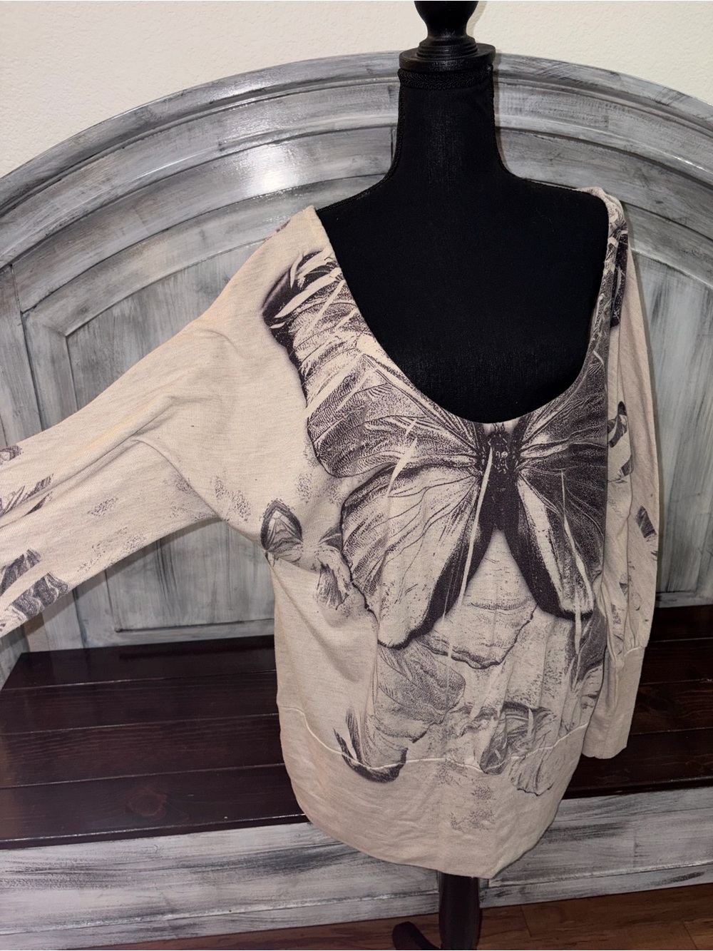 American Rag Beige Scoop-Neck Sweatshirt with Black Butterfly Motif